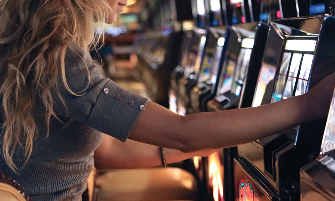 Woman gambling Playing Pokies