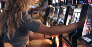 Woman gambling Playing Pokies